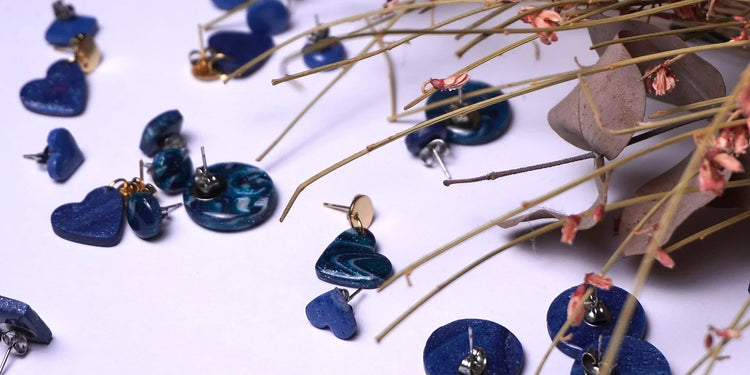 Galaxy Kollektion Ohrringe in dunkelblau und grünlich verschiedene Formen